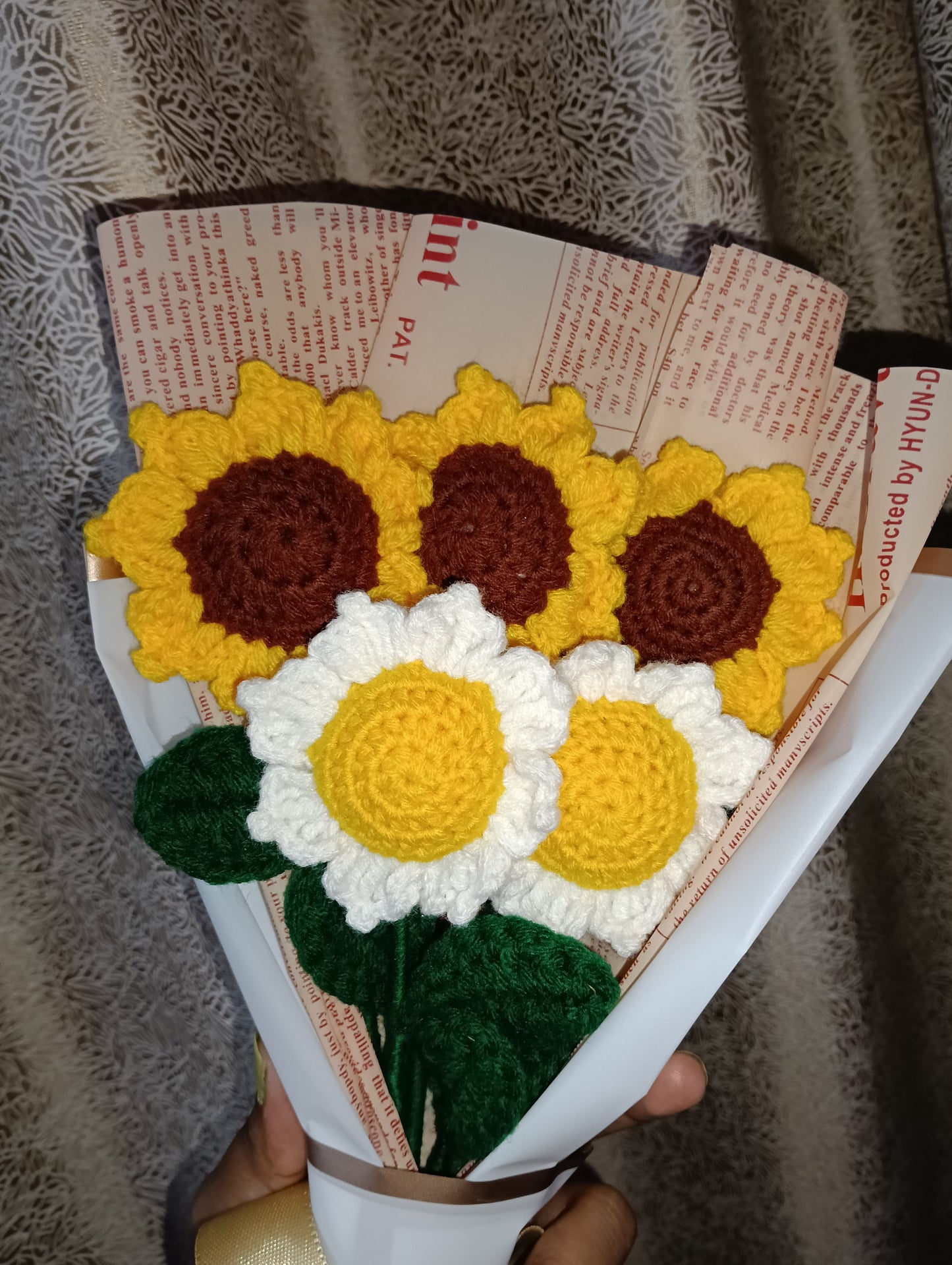 A lovely bouquet of three yellow sunflowers and two white sunflowers, symbolizing happiness, warmth, and peace. Handmade Crosia flowers that never wilt — a perfect gift to brighten someone’s day.