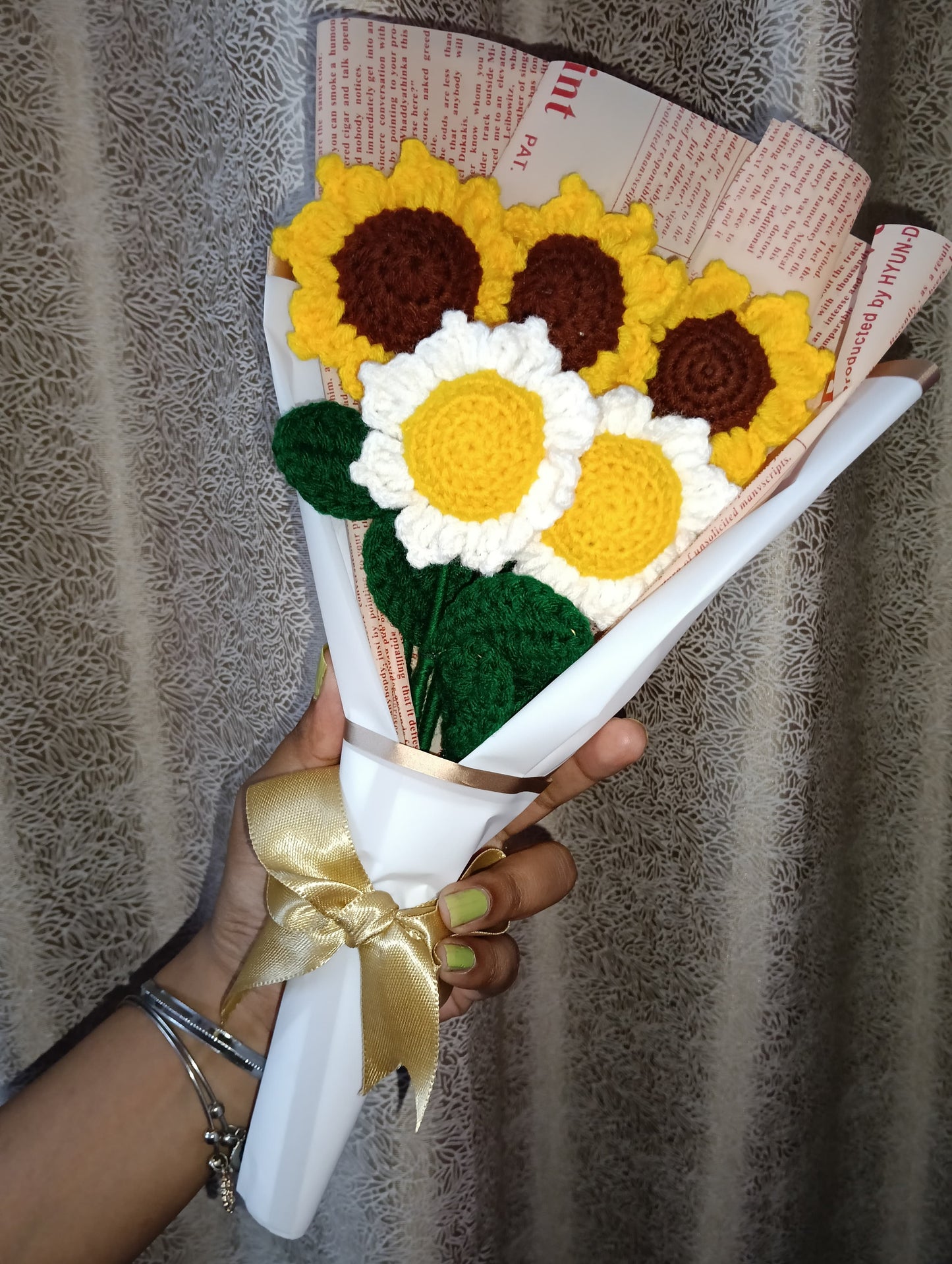 A lovely bouquet of three yellow sunflowers and two white sunflowers, symbolizing happiness, warmth, and peace. Handmade Crosia flowers that never wilt — a perfect gift to brighten someone’s day.